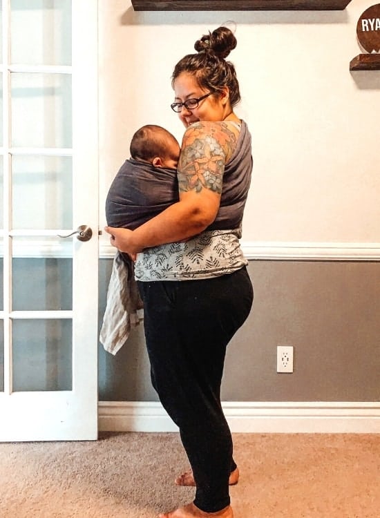 Me (Mom After Baby) wearing my Nalakai Ring Sling in the color Gray Storm with my Newborn Baby