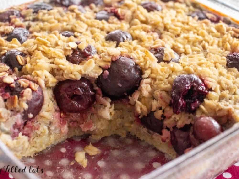 image is a close up of baked cherry oatmeal