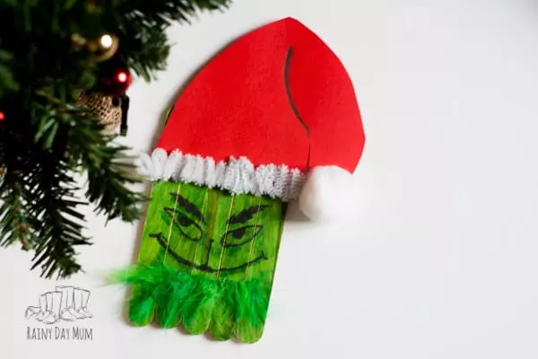 Easy Grinch Popsicle Stick Christmas Craft with Red Hat by Rainy Day Mum 