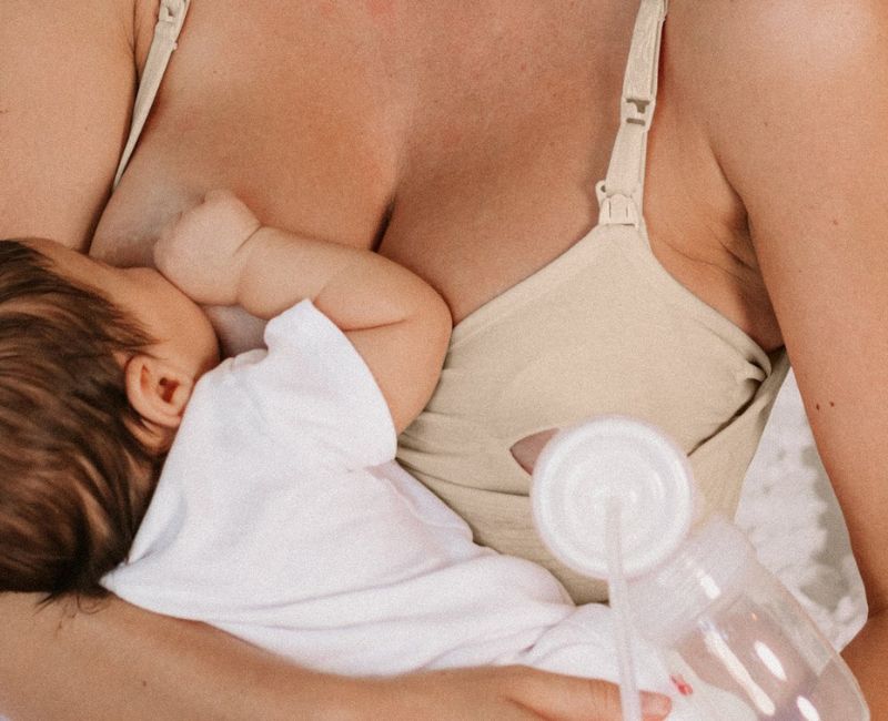 Close up of woman nursing a baby and wearing Kindred Bravely Simply Sublime Bra