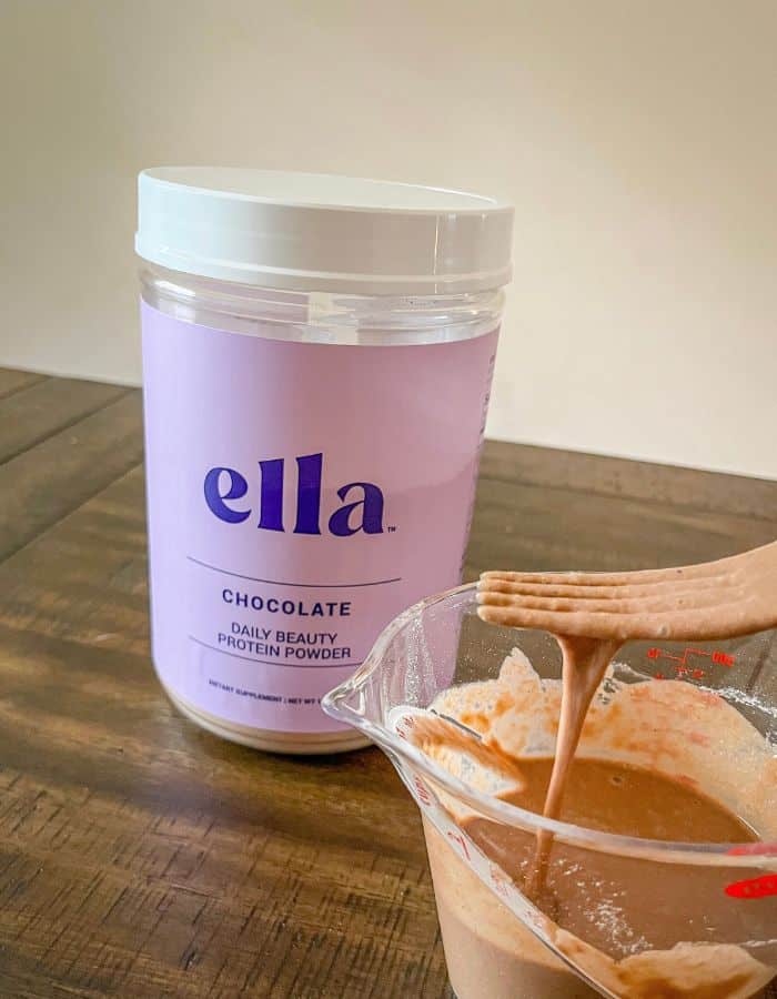 elle beauty collagen protein pancake recipe - close up image of what the pancake batter consistency should be next to the elle protein container