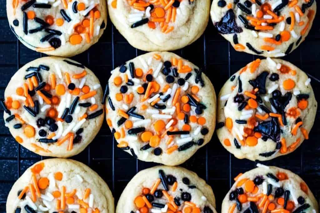 This image shows a flatlay style of halloween sprinkle cookies