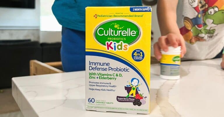Image of Culturelle Kids Probiotics box on a counter with kids in the background