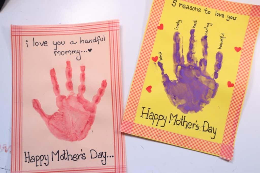 pink and yellow colorful handprint cards - a craft for kids to make for mother's day