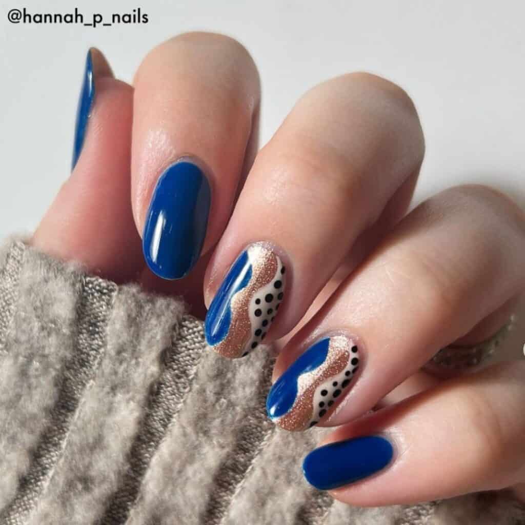 blue abstract nail design by @hannah_p_nails on instagram