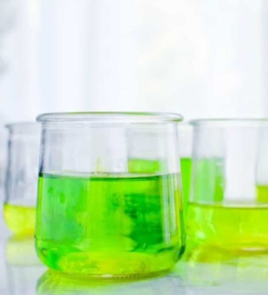 image of clear jars with light green liquid inside