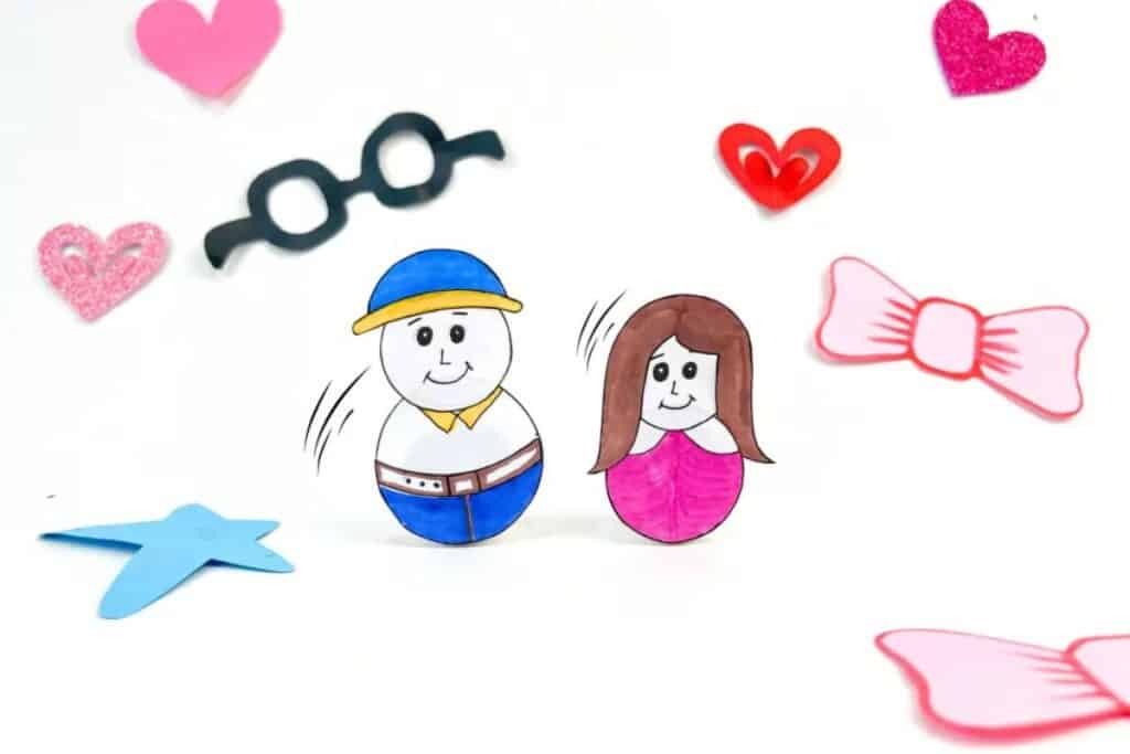 father's day bottle cap craft close up with hearts and other accessories