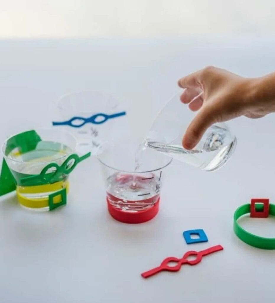 Close up image of water play materials for the Superhero water learning activity