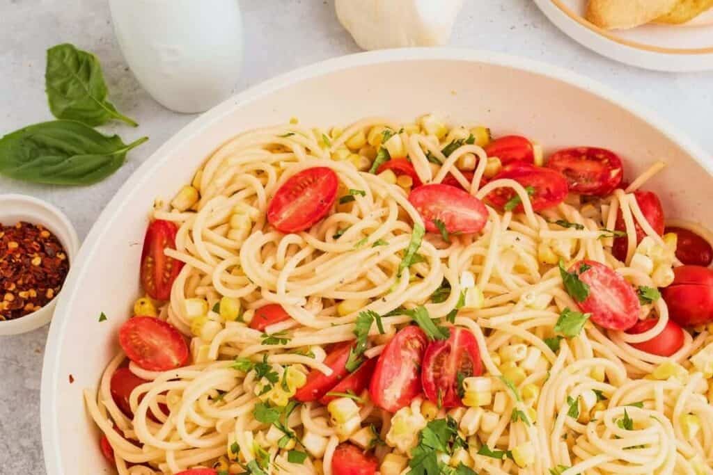pasta noodles with tomatoes and corn