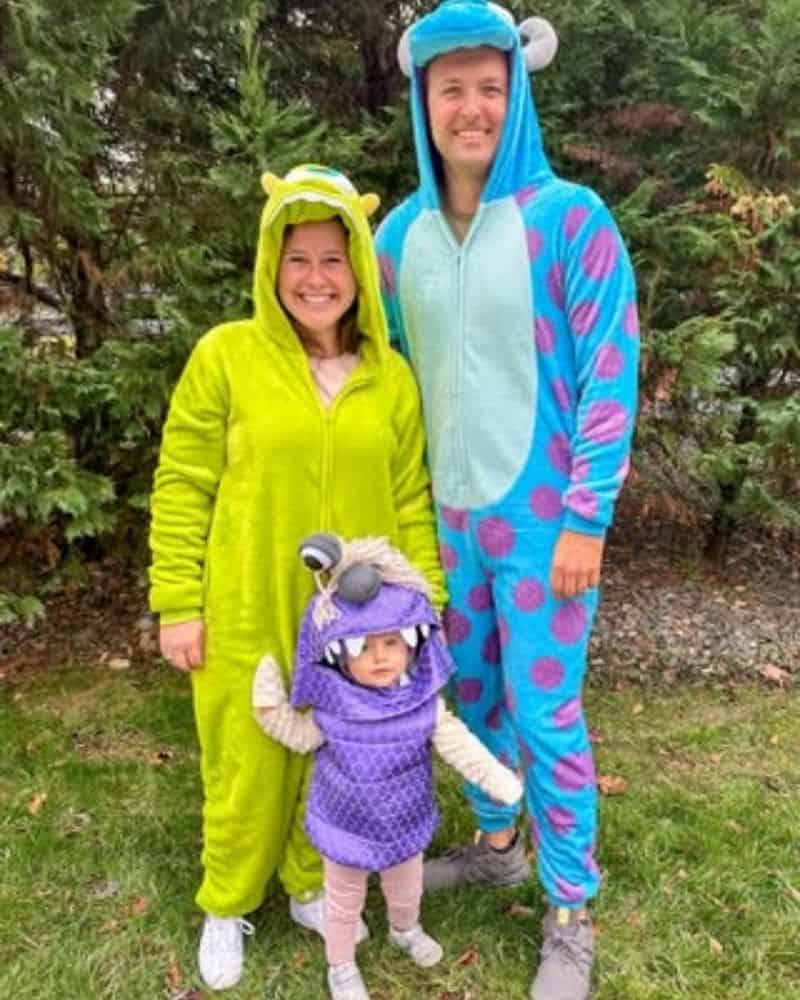Family of 3 dressed as Monsters Inc characters for Halloween