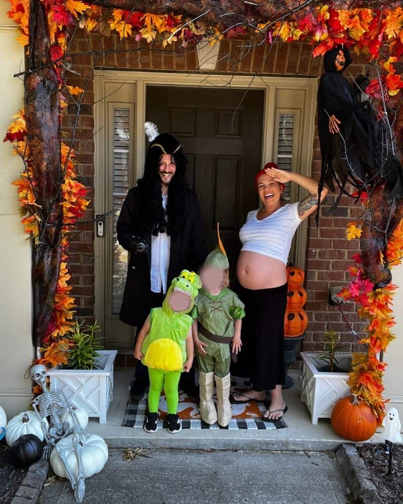 Family of 4 dressed in Peter Pan family costume
