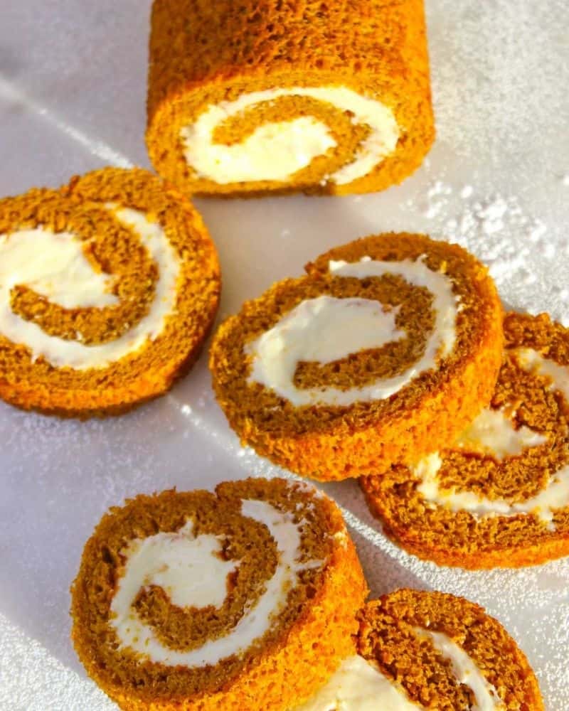 pumpkin roll sliced and laid out on counter