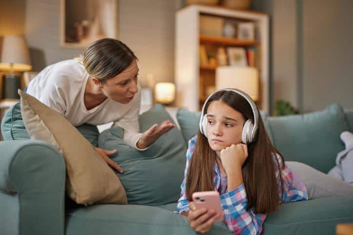 mother speaking to teenager